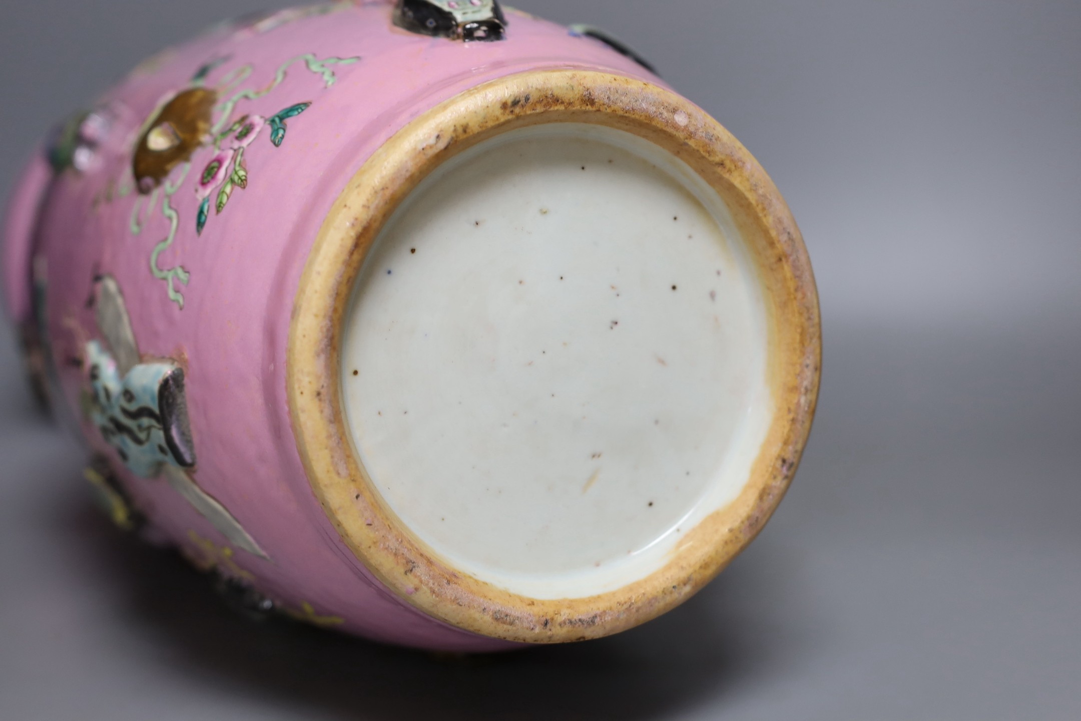 A large Chinese pink ground ‘Hundred Antiques’ vase, 49 cms high.